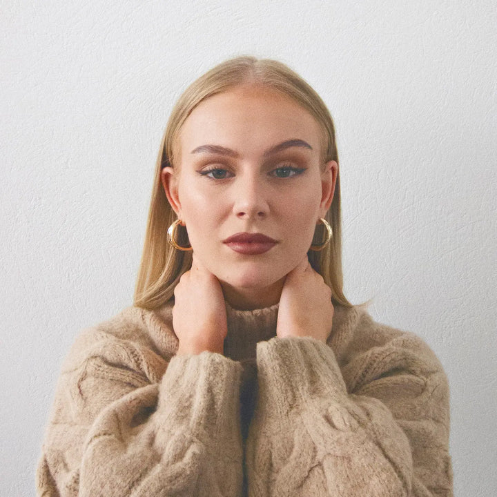 Large hammered hoop earrings Timi of Sweden